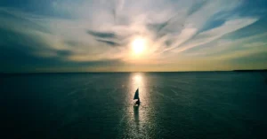Boat going into sunset